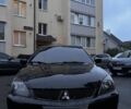 Чорний Міцубісі Lancer, об'ємом двигуна 1.6 л та пробігом 270 тис. км за 5000 $, фото 1 на Automoto.ua