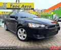 Чорний Міцубісі Lancer, об'ємом двигуна 2 л та пробігом 20800 тис. км за 6999 $, фото 1 на Automoto.ua