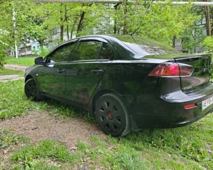 Чорний Міцубісі Lancer, об'ємом двигуна 2 л та пробігом 200 тис. км за 5300 $, фото 1 на Automoto.ua