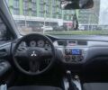 Черный Мицубиси Лансер, объемом двигателя 1.6 л и пробегом 226 тыс. км за 3750 $, фото 7 на Automoto.ua