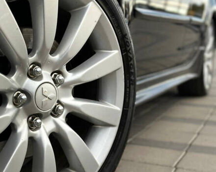 Черный Мицубиси Лансер, объемом двигателя 2 л и пробегом 236 тыс. км за 7950 $, фото 4 на Automoto.ua