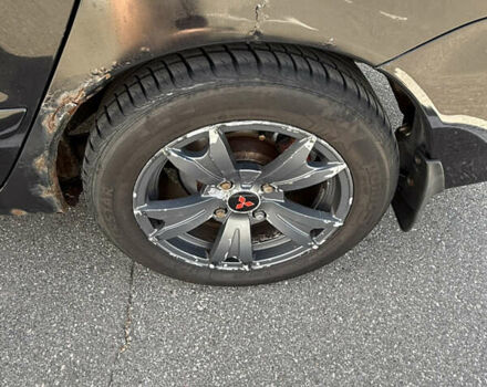 Черный Мицубиси Лансер, объемом двигателя 1.6 л и пробегом 321 тыс. км за 5000 $, фото 15 на Automoto.ua