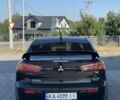 Чорний Міцубісі Lancer, об'ємом двигуна 2 л та пробігом 200 тис. км за 5650 $, фото 4 на Automoto.ua