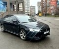 Черный Мицубиси Лансер, объемом двигателя 2 л и пробегом 217 тыс. км за 7000 $, фото 24 на Automoto.ua