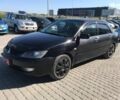Чорний Міцубісі Lancer, об'ємом двигуна 1.6 л та пробігом 356 тис. км за 4590 $, фото 1 на Automoto.ua