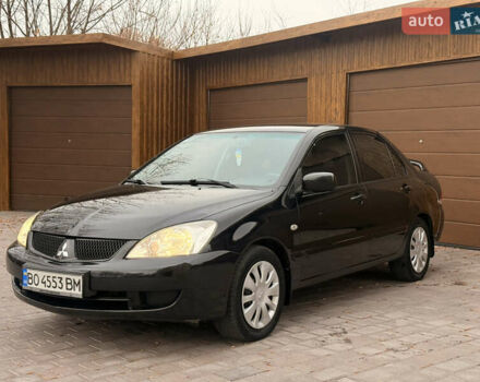 Чорний Міцубісі Lancer, об'ємом двигуна 1.6 л та пробігом 265 тис. км за 4700 $, фото 5 на Automoto.ua