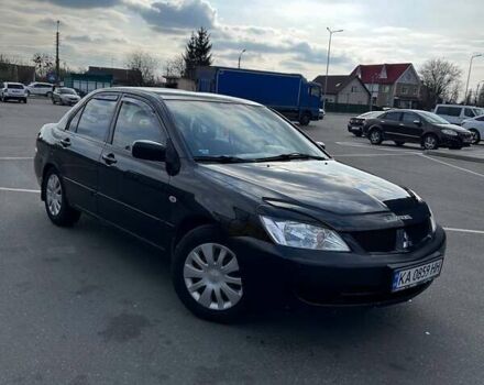 Чорний Міцубісі Lancer, об'ємом двигуна 1.6 л та пробігом 310 тис. км за 3500 $, фото 31 на Automoto.ua