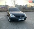 Черный Мицубиси Лансер, объемом двигателя 1.58 л и пробегом 223 тыс. км за 3800 $, фото 1 на Automoto.ua