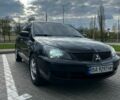 Чорний Міцубісі Lancer, об'ємом двигуна 1.58 л та пробігом 290 тис. км за 4999 $, фото 1 на Automoto.ua