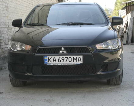 Черный Мицубиси Лансер, объемом двигателя 1.5 л и пробегом 110 тыс. км за 6950 $, фото 5 на Automoto.ua