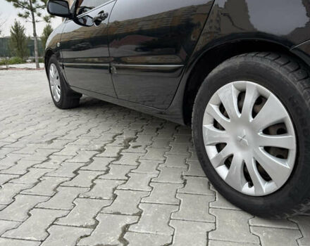 Черный Мицубиси Лансер, объемом двигателя 1.6 л и пробегом 240 тыс. км за 5200 $, фото 5 на Automoto.ua