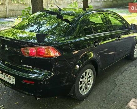 Черный Мицубиси Лансер, объемом двигателя 1.5 л и пробегом 205 тыс. км за 6300 $, фото 7 на Automoto.ua