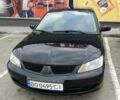 Чорний Міцубісі Lancer, об'ємом двигуна 1.6 л та пробігом 193 тис. км за 5750 $, фото 1 на Automoto.ua
