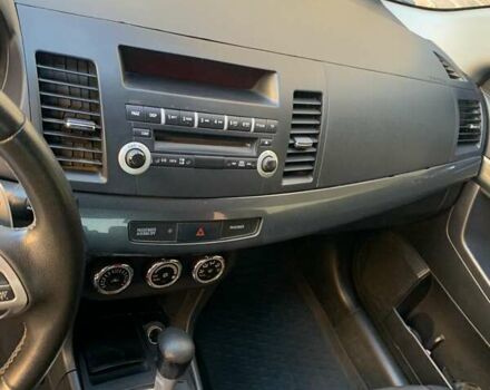 Черный Мицубиси Лансер, объемом двигателя 2 л и пробегом 210 тыс. км за 7000 $, фото 8 на Automoto.ua