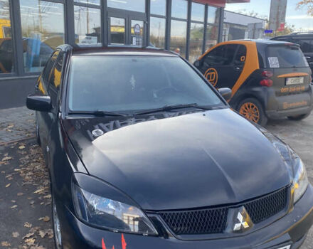 Мицубиси Лансер 2008 в Киеве на Automoto.ua Черный Мицубиси Лансер, объемом двигателя 1.6 л и пробегом 72 тыс. км за 2650 $, фото 1 на Automoto.ua