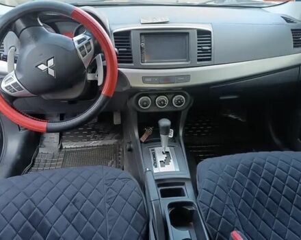 Мицубиси Лансер 2008 в Львове на Automoto.ua Черный Мицубиси Лансер, объемом двигателя 2 л и пробегом 210 тыс. км за 6500 $, фото 8 на Automoto.ua