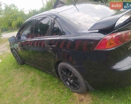 Чорний Міцубісі Lancer, об'ємом двигуна 2 л та пробігом 183 тис. км за 5000 $, фото 3 на Automoto.ua