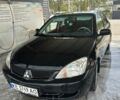 Чорний Міцубісі Lancer, об'ємом двигуна 1.6 л та пробігом 250 тис. км за 3900 $, фото 2 на Automoto.ua