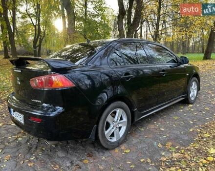 Чорний Міцубісі Lancer, об'ємом двигуна 2 л та пробігом 237 тис. км за 7500 $, фото 13 на Automoto.ua