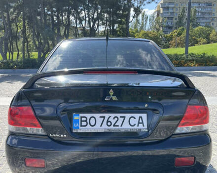 Мицубиси Лансер 2008 в Днепре (Днепропетровске) на Automoto.ua Черный Мицубиси Лансер, объемом двигателя 1.6 л и пробегом 230 тыс. км за 4999 $, фото 4 на Automoto.ua