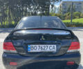 Мицубиси Лансер 2008 в Днепре (Днепропетровске) на Automoto.ua Черный Мицубиси Лансер, объемом двигателя 1.6 л и пробегом 230 тыс. км за 4999 $, фото 4 на Automoto.ua