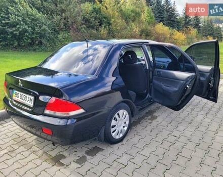 Міцубісі Lancer 2008 у Тернополі на Automoto.ua Чорний Міцубісі Lancer, об'ємом двигуна 1.58 л та пробігом 182 тис. км за 5600 $, фото 11 на Automoto.ua