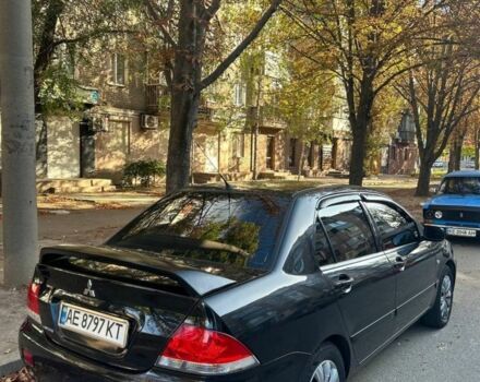 Міцубісі Lancer 2008 у Кривому Розі на Automoto.ua Чорний Міцубісі Lancer, об'ємом двигуна 1.6 л та пробігом 230 тис. км за 4380 $, фото 4 на Automoto.ua