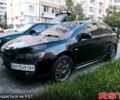 Черный Мицубиси Лансер, объемом двигателя 2 л и пробегом 248 тыс. км за 5900 $, фото 1 на Automoto.ua