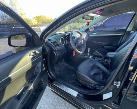 Чорний Міцубісі Lancer, об'ємом двигуна 2 л та пробігом 223 тис. км за 7800 $, фото 11 на Automoto.ua