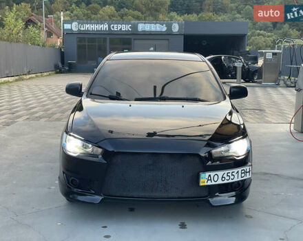 Чорний Міцубісі Lancer, об'ємом двигуна 2 л та пробігом 300 тис. км за 4600 $, фото 12 на Automoto.ua