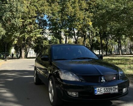 Черный Мицубиси Лансер, объемом двигателя 1.6 л и пробегом 184 тыс. км за 3700 $, фото 1 на Automoto.ua