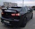 Черный Мицубиси Лансер, объемом двигателя 1.5 л и пробегом 278 тыс. км за 5300 $, фото 1 на Automoto.ua