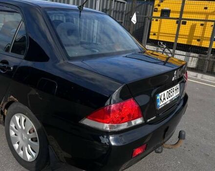 Чорний Міцубісі Lancer, об'ємом двигуна 1.6 л та пробігом 310 тис. км за 3500 $, фото 10 на Automoto.ua