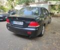 Чорний Міцубісі Lancer, об'ємом двигуна 1.6 л та пробігом 335 тис. км за 3100 $, фото 12 на Automoto.ua
