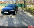 Черный Мицубиси Лансер, объемом двигателя 2 л и пробегом 204 тыс. км за 6900 $, фото 2 на Automoto.ua