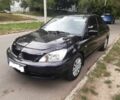 Чорний Міцубісі Lancer, об'ємом двигуна 1.6 л та пробігом 175 тис. км за 5300 $, фото 1 на Automoto.ua