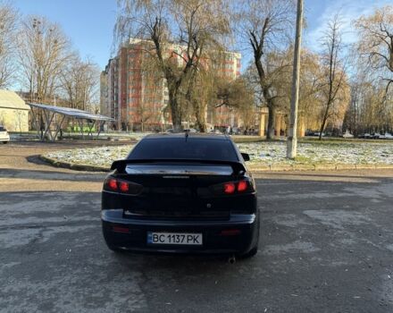 Черный Мицубиси Лансер, объемом двигателя 2 л и пробегом 236 тыс. км за 6550 $, фото 5 на Automoto.ua