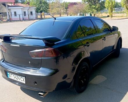 Черный Мицубиси Лансер, объемом двигателя 1.5 л и пробегом 270 тыс. км за 4400 $, фото 3 на Automoto.ua