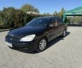Чорний Міцубісі Lancer, об'ємом двигуна 1.6 л та пробігом 151 тис. км за 4699 $, фото 1 на Automoto.ua