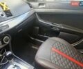 Чорний Міцубісі Lancer, об'ємом двигуна 2 л та пробігом 240 тис. км за 7850 $, фото 29 на Automoto.ua