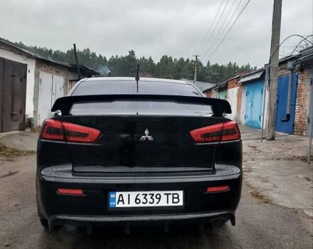 Чорний Міцубісі Lancer, об'ємом двигуна 2 л та пробігом 210 тис. км за 7100 $, фото 3 на Automoto.ua