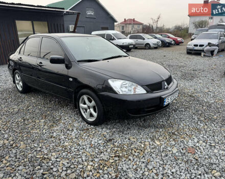 Черный Мицубиси Лансер, объемом двигателя 1.58 л и пробегом 202 тыс. км за 4100 $, фото 2 на Automoto.ua