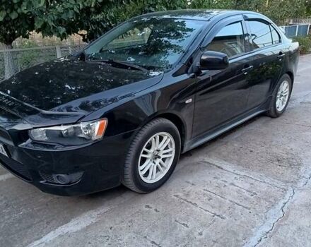 Черный Мицубиси Лансер, объемом двигателя 1.5 л и пробегом 167 тыс. км за 5500 $, фото 1 на Automoto.ua