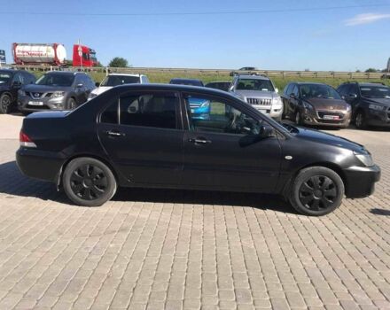 Мицубиси Лансер 2008 в Львове на Automoto.ua Черный Мицубиси Лансер, объемом двигателя 1.6 л и пробегом 356 тыс. км за 4340 $, фото 9 на Automoto.ua