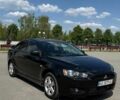 Черный Мицубиси Лансер, объемом двигателя 1.5 л и пробегом 285 тыс. км за 5199 $, фото 1 на Automoto.ua