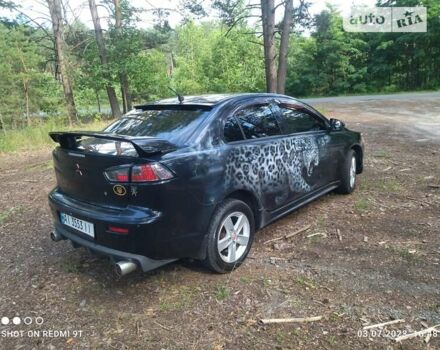 Чорний Міцубісі Lancer, об'ємом двигуна 2 л та пробігом 150 тис. км за 7600 $, фото 10 на Automoto.ua