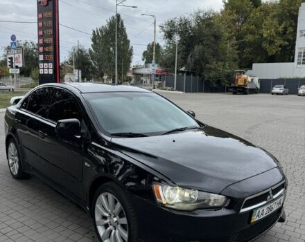 Черный Мицубиси Лансер, объемом двигателя 2 л и пробегом 200 тыс. км за 6800 $, фото 3 на Automoto.ua