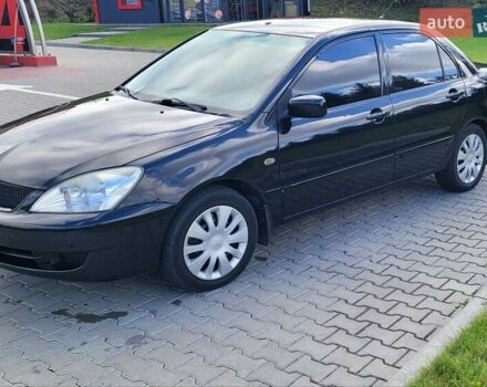 Міцубісі Lancer 2008 у Тернополі на Automoto.ua Чорний Міцубісі Lancer, об'ємом двигуна 1.58 л та пробігом 182 тис. км за 5600 $, фото 3 на Automoto.ua