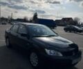 Чорний Міцубісі Lancer, об'ємом двигуна 1.6 л та пробігом 310 тис. км за 3500 $, фото 2 на Automoto.ua