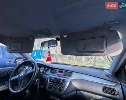 Чорний Міцубісі Lancer, об'ємом двигуна 1.6 л та пробігом 310 тис. км за 3500 $, фото 46 на Automoto.ua